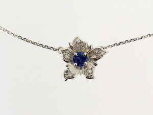 Love in the Mist Flower Pendant in 18ct White Gold with Diamonds and Sapphire